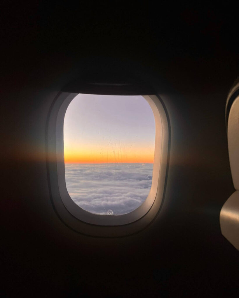 Airplane window sunset